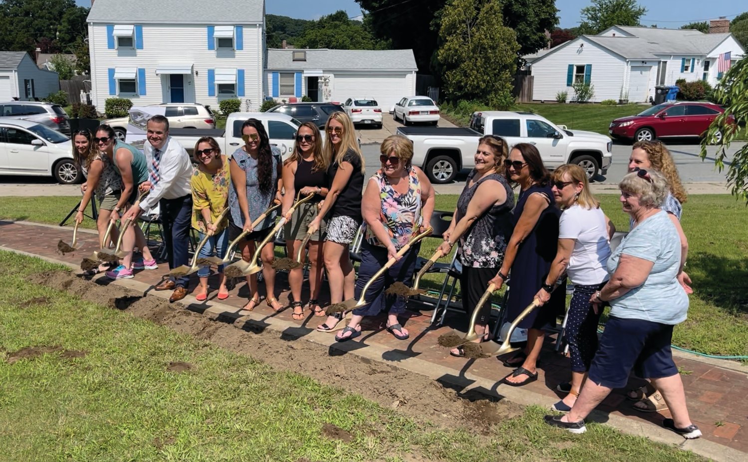 BULLDOG PRIDE:  Educators from Garden City School grabbed the golden shovels to stage their own groundbreaking following the formal ceremony last week.